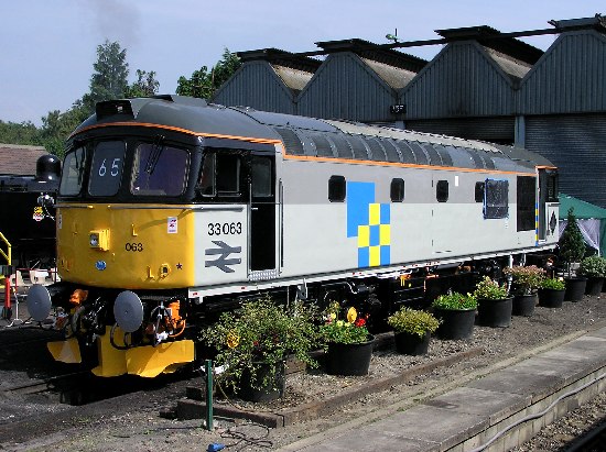 33063 in Construction triple grey in the yard at Tunbridge Wells West